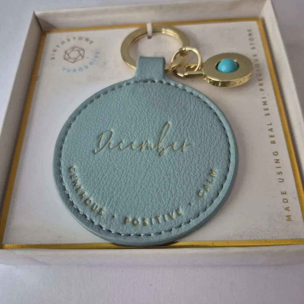 Katie Loxton December Birthstone Generous Positive Calm Round Leather Keychain
